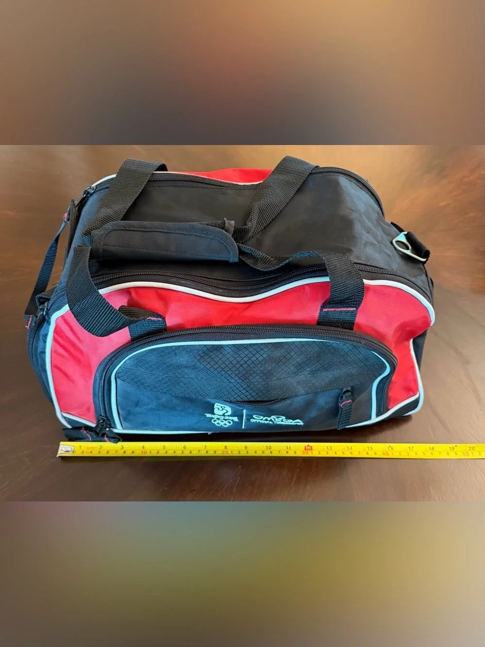 Omega Red and Black Men's Travel Duffel with Teal Trim